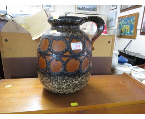 VINTAGE GERMAN POTTERY VASE WITH HANDLE.