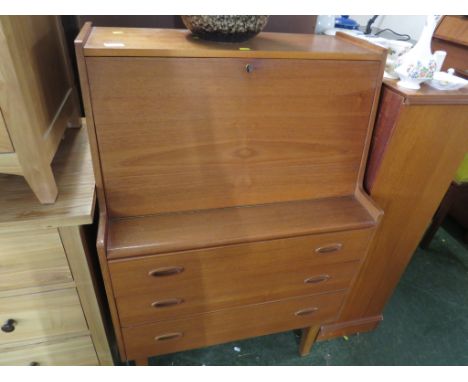VINTAGE TEAK THREE-DRAWER BUREAU ON LEGS