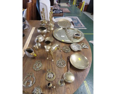 ENGRAVED BRASS TRAY, BRASS SKIMMER , CANDLE STICKS , NUT CRACKER , HORSE BRASS AND OTHER BRASS WARE