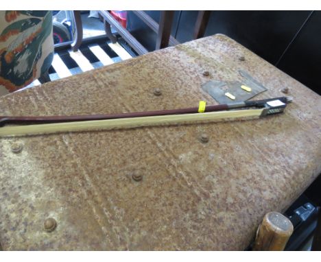 VIOLIN BOW MARKED T BOLTON WITH WHITE METAL MOUNTS.