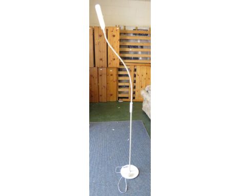 FLOOR STANDING DIRECTIONAL LAMP.