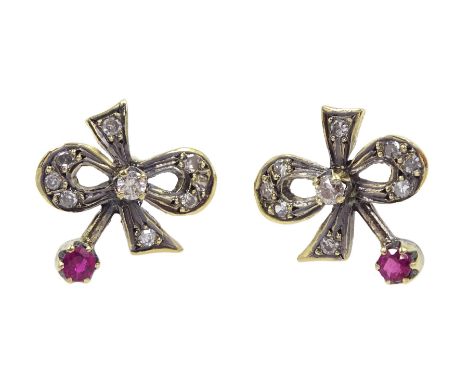 Pair of 17ct gold diamond and ruby bow stud earrings - Condition Report Approx 2.4gm, tested to 17ct, length = 12mm 