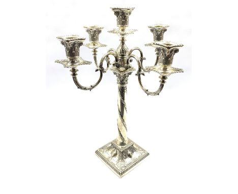 Edwardian silver five light candelabrum of Adam design with scroll branches, the square base cast with urns and foliage H46cm