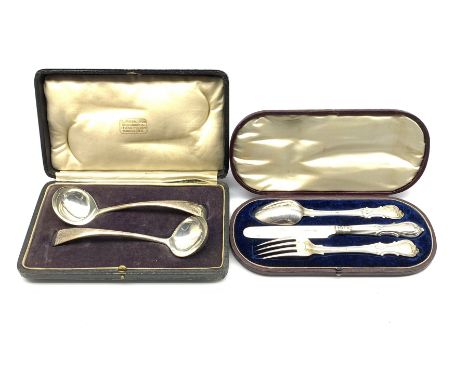 Cased pair of silver sauce ladles London 1923 Maker Josiah Williams &amp; Co., and a Victorian silver three piece christening