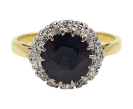 Gold sapphire and diamond cluster ring, stamped 18ct - Condition Report Approx 3.3gm, size K, overall head diameter = 10mm