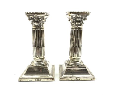 Pair of Victorian silver Corinthian column candlesticks on square bases H15cm London 1888 Maker Martin Hall &amp; Co, only on