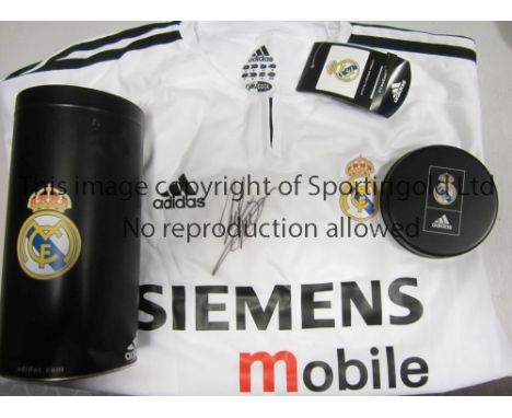 ZIDANE       Signed Zinadine Zidane Real Madrid replica shirt. Comes in an Adidas tin. Generally good      