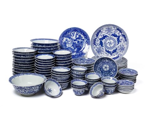 A LARGE QUANTITY OF BLUE AND WHITE PRINTED DINNERWARE
Comprising eight plates, twenty-three bowls with flaring rim, four bowl