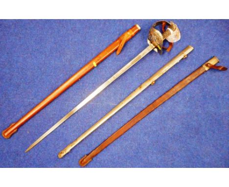 Infantry officer's pattern 1897 sword. Unusual cypher, possibly E.R.I. (Edward Emperor of India). In leather covered scabbard