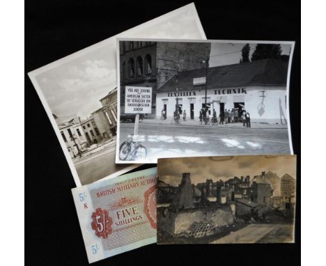 Photograph of Berlin 1944, two post war photographs, British Military Authority five shilling note and a fork engraved to R.A