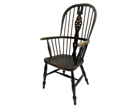 19th century stained elm and beech Windsor chair, high hoop and stick back with pierced wheel splat over shaped saddle seat, 