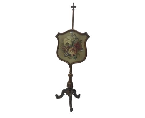 Victorian mahogany pole screen, floral finial, the glazed shield screen framing floral beadwork panel, turned column on cabri