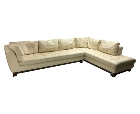 Roche-Bobois - large corner sofa, upholstered in ivory leather with buttoned seat cushions, raised on a stained beech base wi