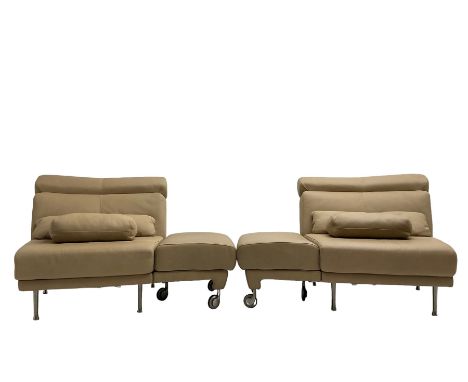 Natuzzi - Italian modular two seat sofa, the two triangular sections with adjustable head rests and interconnected swing end 