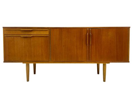 Morris of Glasgow - mid-20th century teak sideboard, fitted with double cupboard and single drawer above fall-front cabinet, 