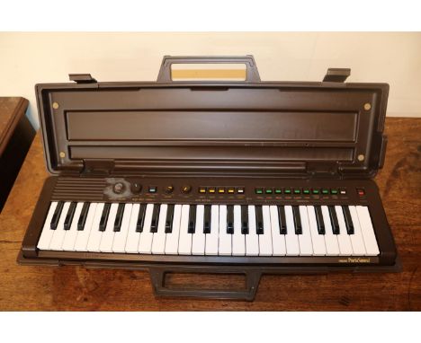 Cased Vintage Yamaha Porta Sound Keyboard 