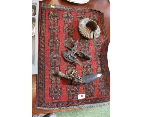 Small Prayer rug, Khukri, Large slave bangle and a Spear/axe head with Dragon decoration 