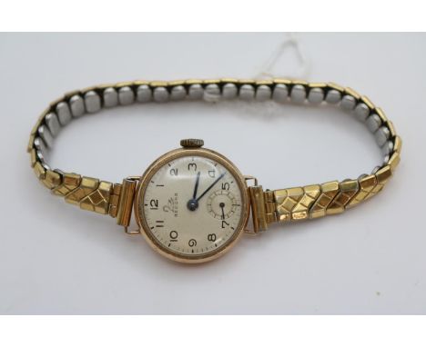 Vintage 9ct Gold Record wristwatch with gold plated expanding bracelet 