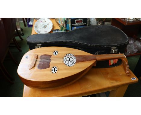 Early 20th century cased walnut lute