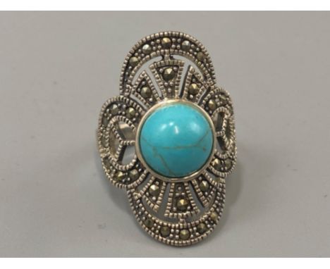A substantial silver Marcasite and turquoise panelled ring, weight 7.05grams