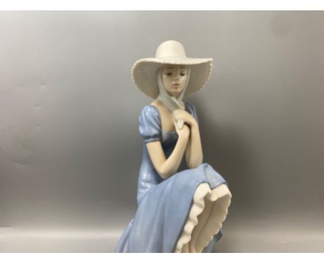 Nao by Lladro figure lady with hat in good condition