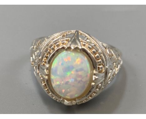 A silver CZ and opal panelled dress ring, weight 5.0grams