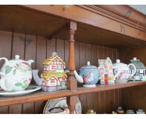 Six teapots, including cashmere Victorian Garden; Leonardo Collection - Toy Shop; The English Tea Collection by Roy Kirkham -