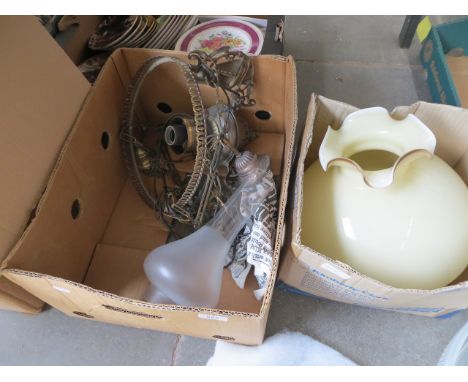 A vintage light fitting with glass shade 
