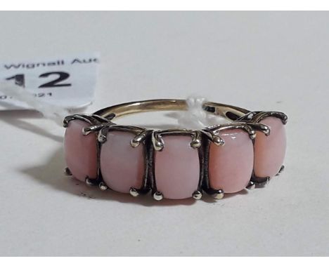 A five stone common pink opal cabochon ring, marked '925', gross weight 4.30g, size R. 