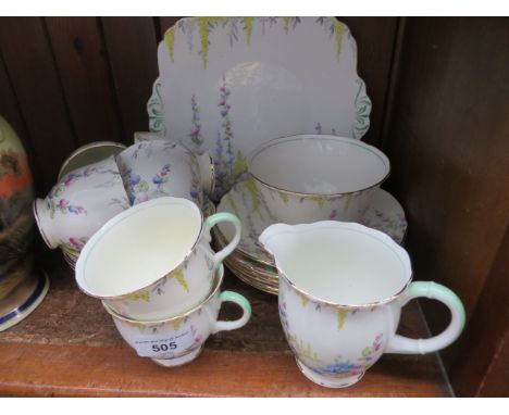 21 pieces Foley china teaware comprising teapot stand, 6 plates, 6 saucers, 4 teacups, 2 coffee cups, milk jug and sugar bowl