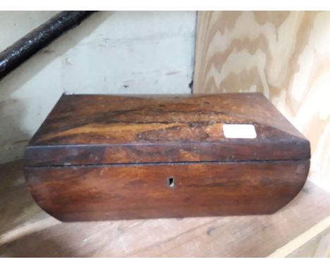 A 19th century rosewood tea caddy of sarcophagus form, length 37cm.Condition: some areas of water damage including spots to t
