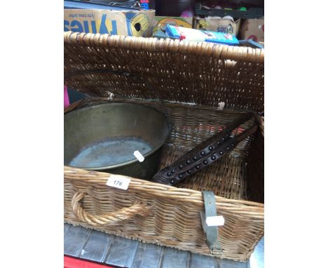 A wicker hamper, jam pan, and bellows 