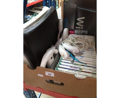 A box of WII items to include console, WII boards, games, controllers and accessories etc. 