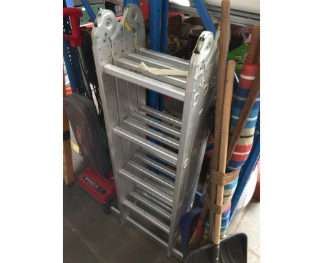 A multi purpose folding ladder 
