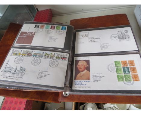 Approx 140 First Day Covers in 2 albums 