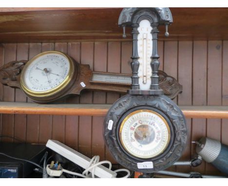 An Aneroid barometer and another 
