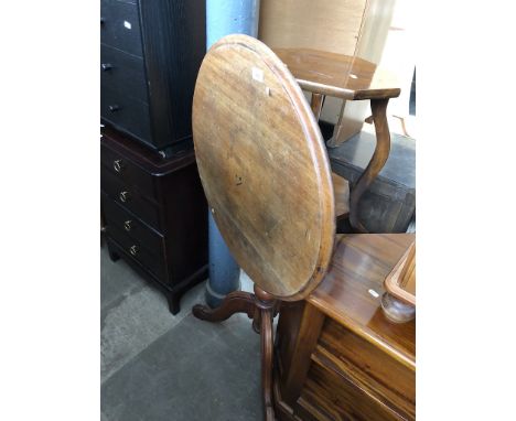 A flip top tripod table and an octagonal plant stand 