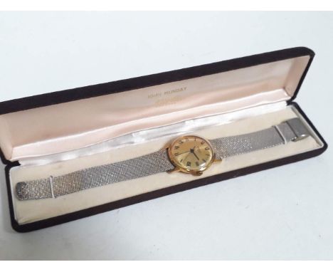A vintage gold plated Sekonda 17 jewel manual wind wristwatch with stainless steel bracelet strap, case diameter 34mm, comes 