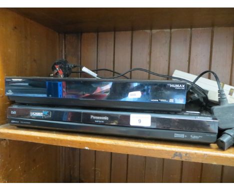 A Panasonic dvd recorder and a Humax digibox with remotes 