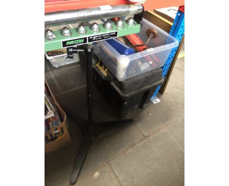 Two boxes of tools and a roller stand 