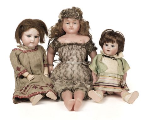 * Dolls. A bisque head doll, French, early 20th century, composition character doll with articulated limbs, bisque head impre