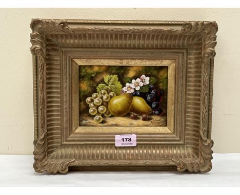 JOHN F SMITH. BRITISH 20TH CENTURY (ROYAL WORCESTER PAINTER). Still lives of fruit and flowers on a bank. A pair. Signed. Oil