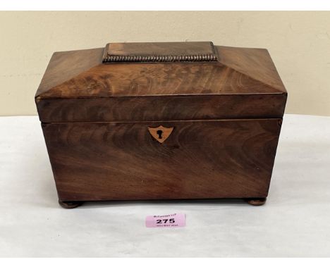 A George IV mahogany sarcophagus tea caddy. 9" wide. Interior gutted.