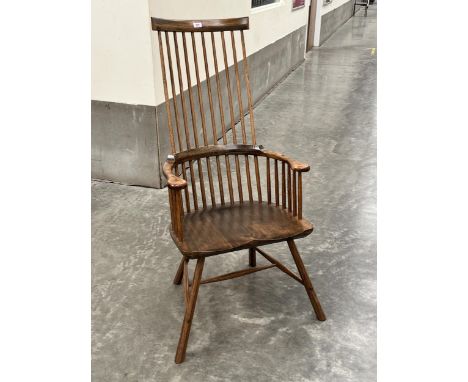 A fine Welsh comb-back Windsor armchair, signed to underside 'John Brown' (Welsh 1933-2008) and signature Celtic cross.