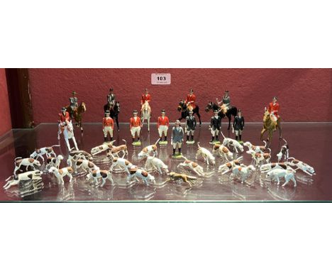 Britains Toys. A collection of hunting figures to comprise seven mounted huntsmen and ladies; seven huntsmen on foot; twenty 