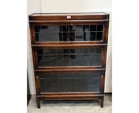 An oak Globe Wernicke bookcase in three leaded glazed sections. 34" w x 47" h.