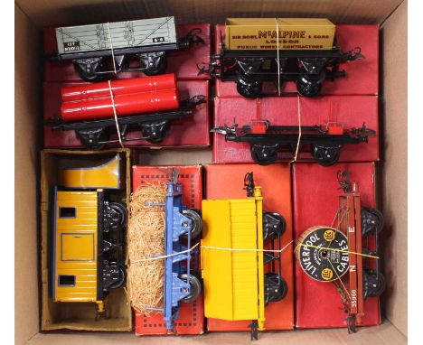 Eight items of Hornby 0-gauge goods wagons. All (NM-M): Pre-war Snowplough yellow with blue edging &amp; black base; blue Fib