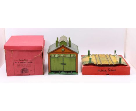 Two Hornby clockwork items: 1930-3 Level crossing No.2, green gateposts, standard double track spacing (E almost NM) box base
