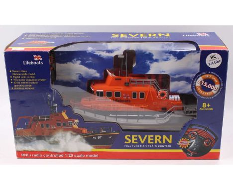 A radio controlled 1/20 model of a RNLI Severn Boat in orange, housed in the original card and plastic window box with remote