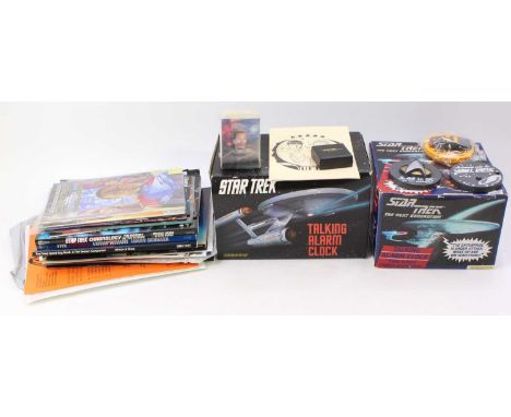 A tray containing Star Trek related novelty items, booklets, and other to include Star Trek The Next Generation talking alarm